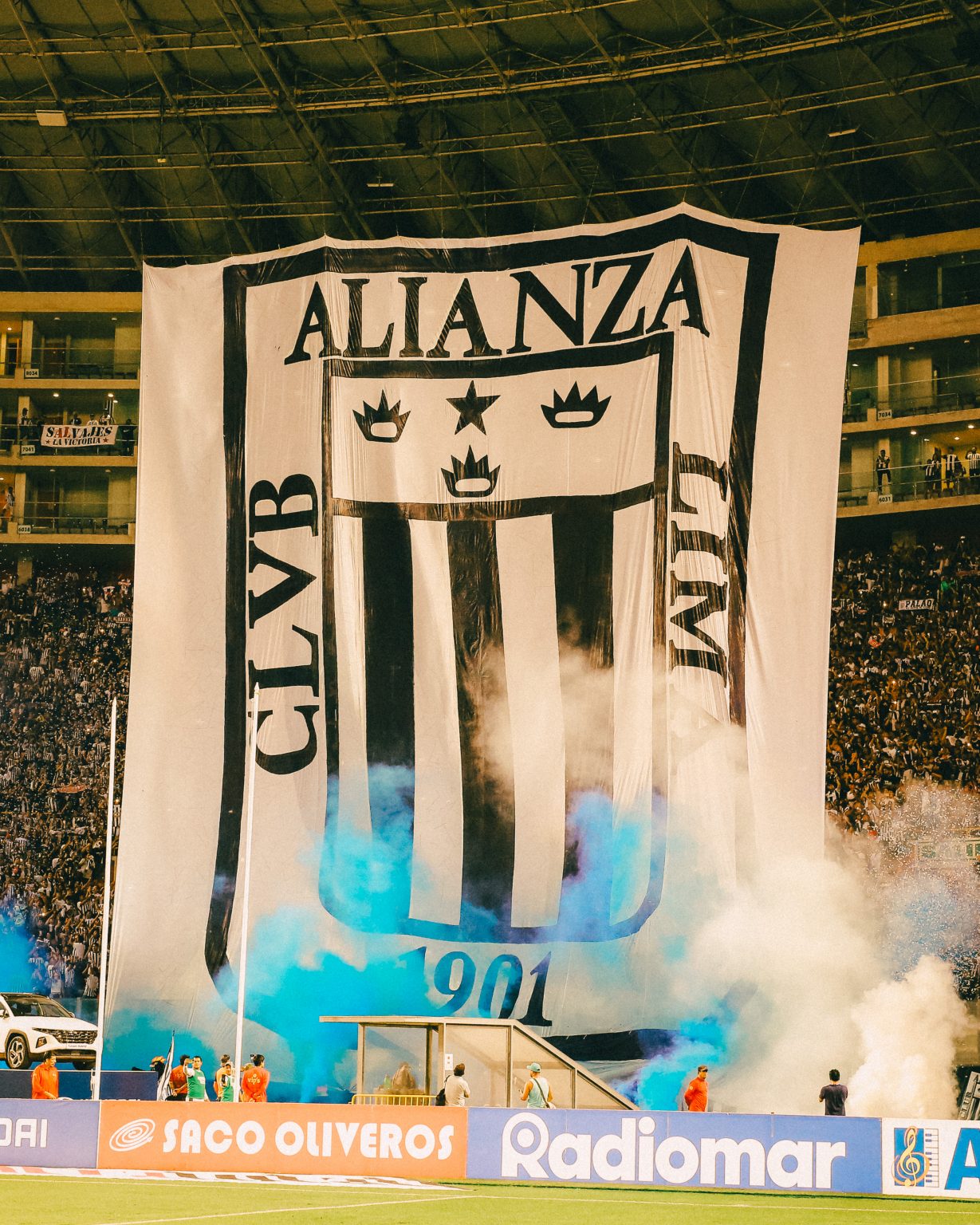 Traditional Alianza Lima football banner during a match in Peru
