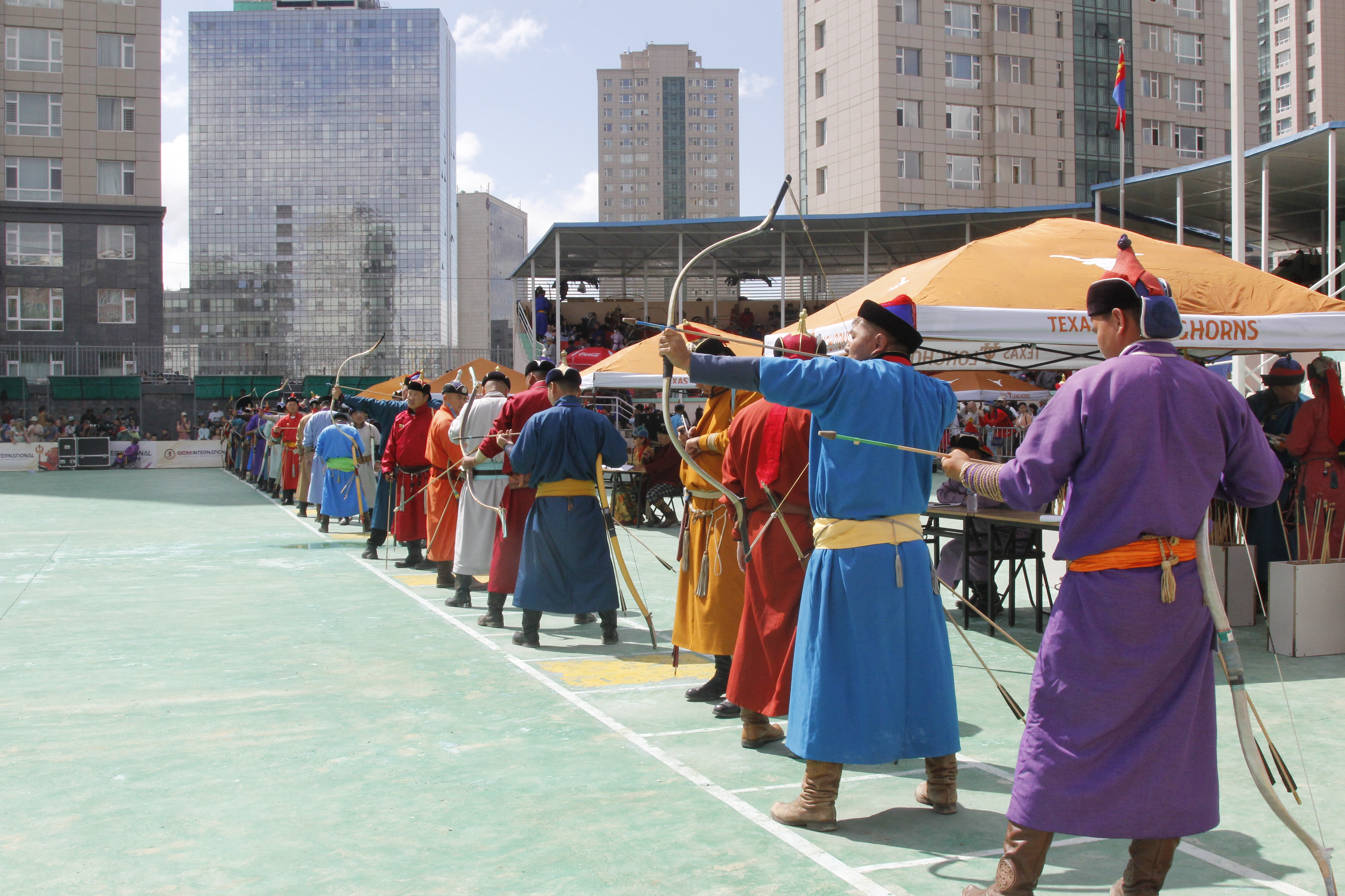 Close-up of a traditional Mongolian bow and arrow at Naadam